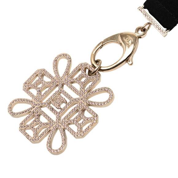 CHANEL Jewelry - CHANEL Black Logo Necklace